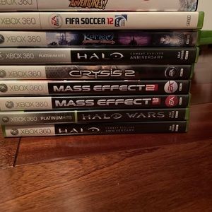 Xbox 360 Black.Comes with DVD player,Kinect,1 steering wheel controller,29 games